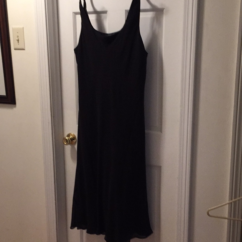 Black silk dress with flutter hem
